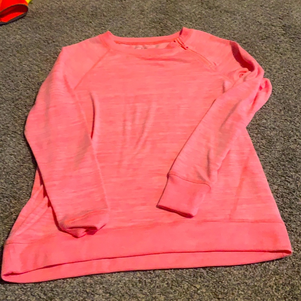 Long sleeve, girls shirt. Comfortable, kinda stretchy material.